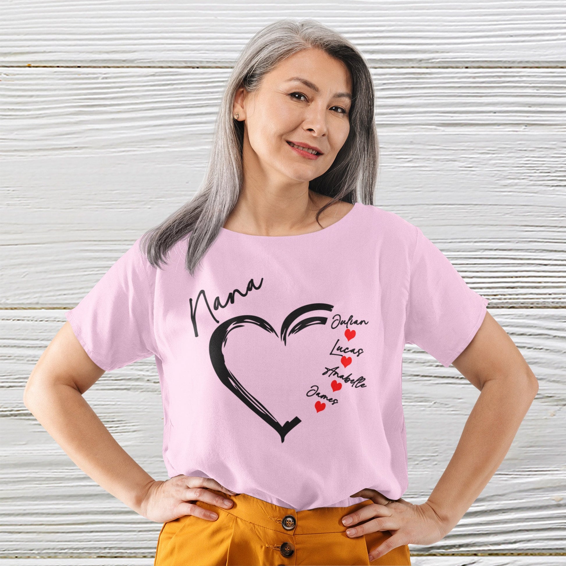 Lady wearing Pink color Nana shirt